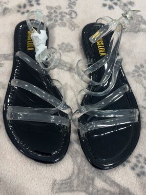 Miss Lola Black Patent Sandals with Clear Straps